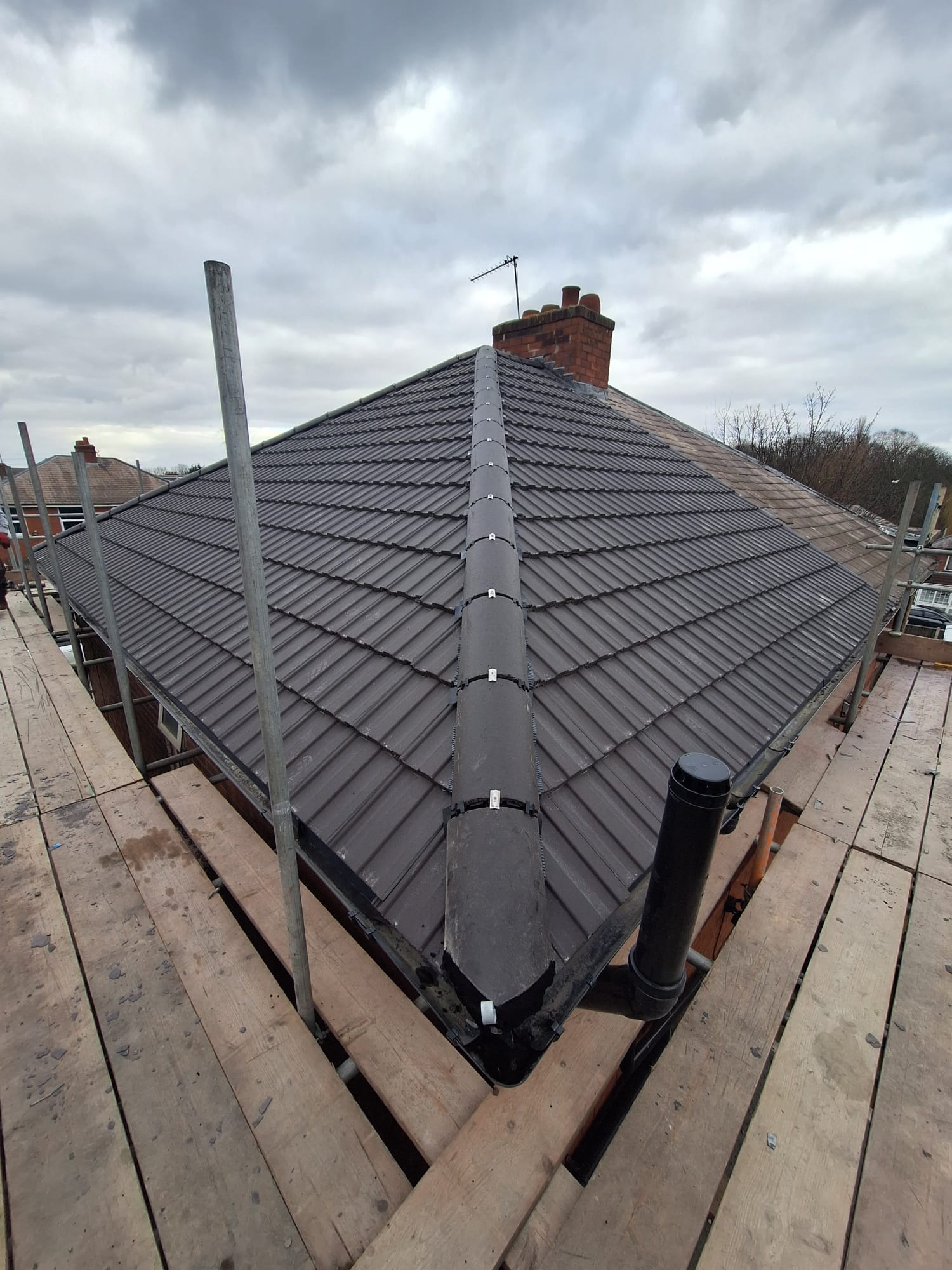 Roofing work completed by Natural Flow Roofing Systems